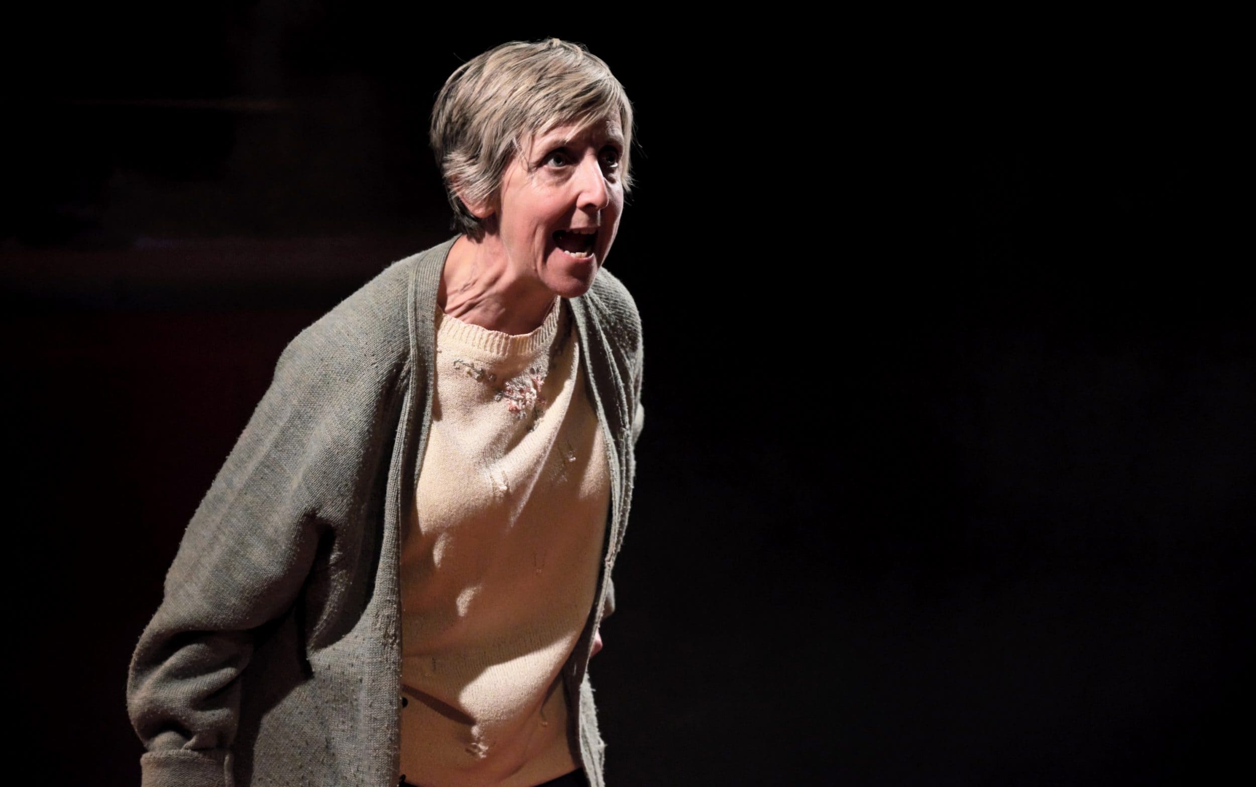 Julie Hesmondhalgh in There Are No Beginnings at Leeds Playhouse. Design, Camilla Clarke; lighting design, Amy Mae. Photo: Zoe Martin.